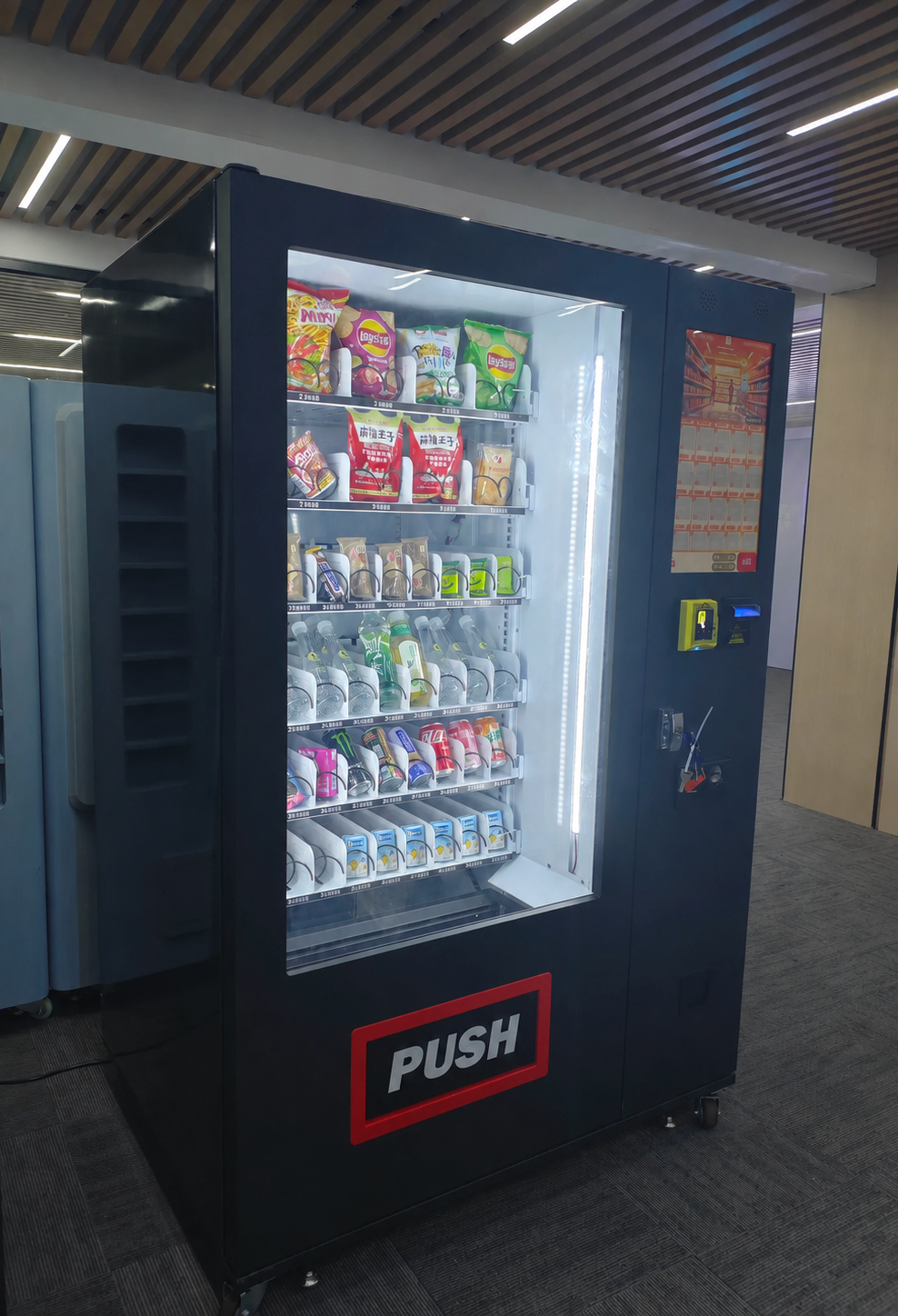 Snack and drink combo vending machine in an office lobby