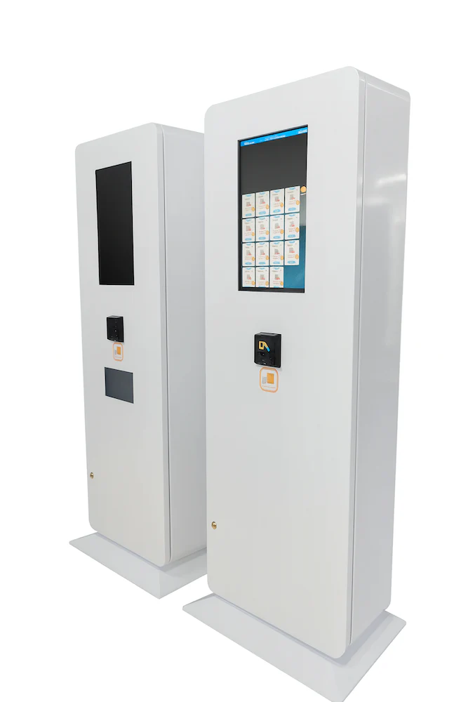 Slim keypad and touchscreen outdoor kiosk vending machines side by side